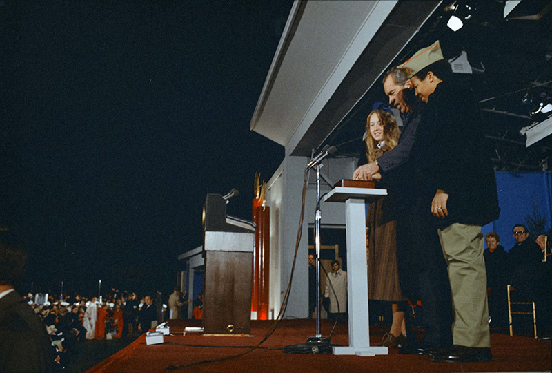 #Nixon50 #OTD 12/14/1973 President Nixon attended the lighting of the Nation’s Christmas Tree on the White House Ellipse. He held the hands of Camp Fire Girl Tyna A. Lee & Boy Scout Warren P. Tilghman as they pressed the button that lit up the tree. (Image: WHPO-E1985-15)