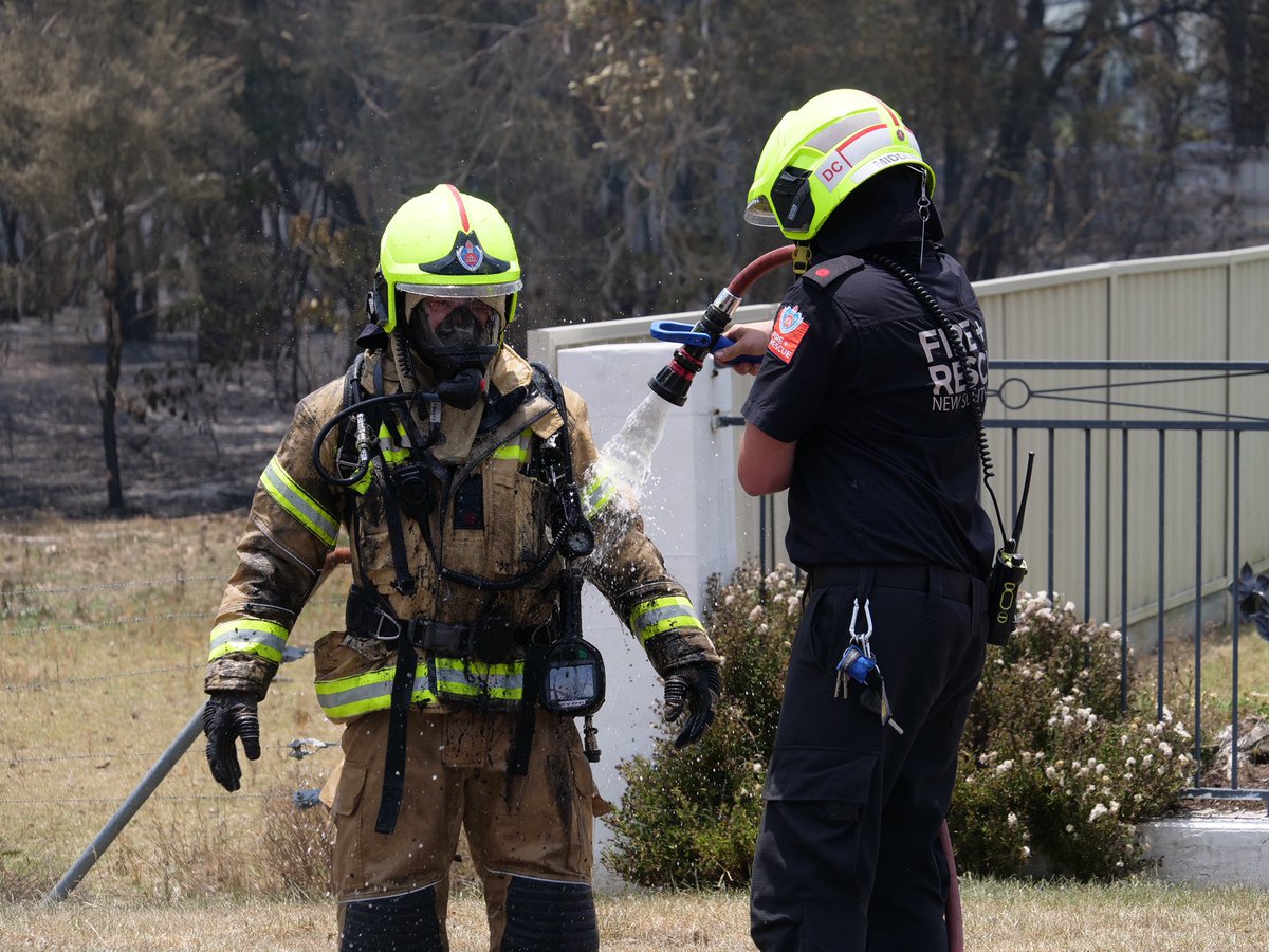 Firefighters work to put out fire in the roof of a home. <a href="/abcnews/">ABC News</a>