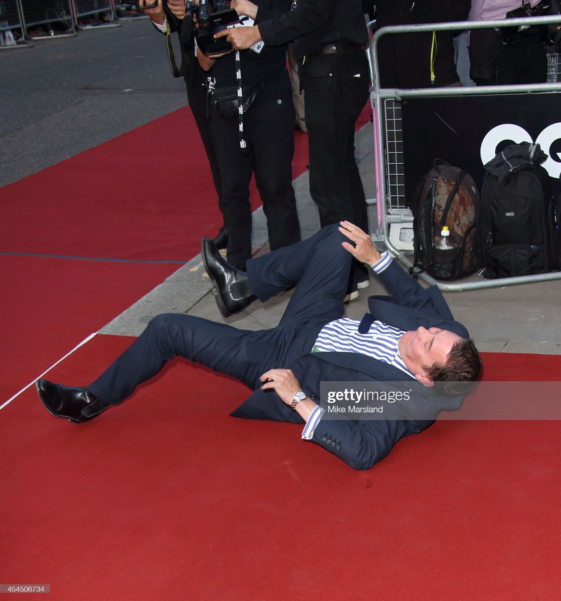 Jools Holland arrives at the GQ Awards in London (2014)