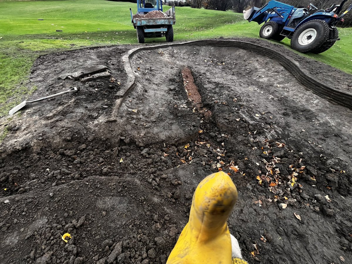 4 New bunkers on 18th just need turfed.