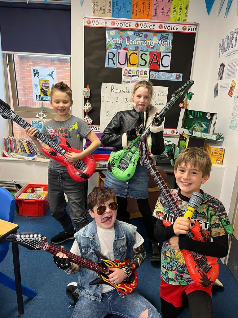 KS2 children and teachers have been enjoying a day of times tables activities, fun maths and dressing up as their TT Rockstars avatar.