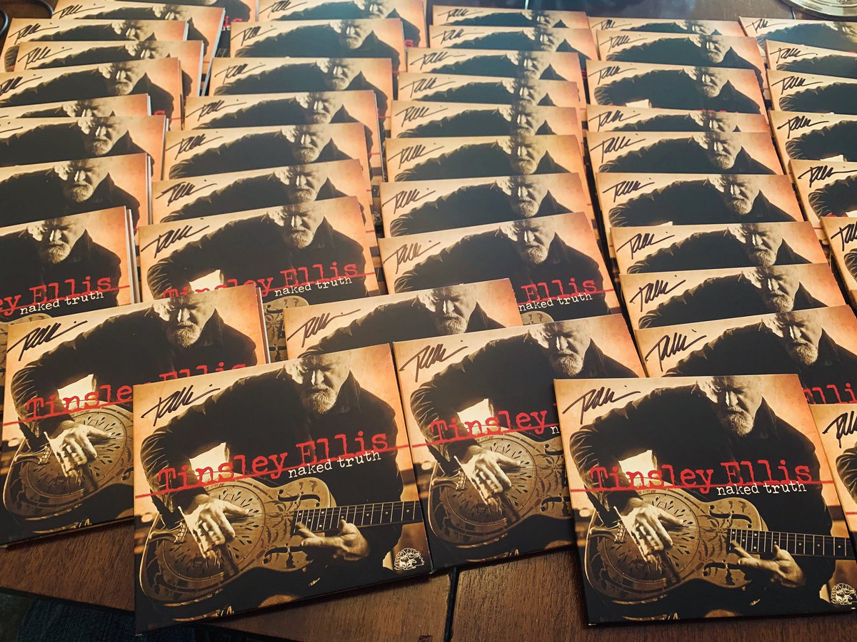 Autographing copies of my first all acoustic album “Naked Truth” for mail orders. Pre-order CD’s and Gold Metallic LP’s at tinsleyellis.com