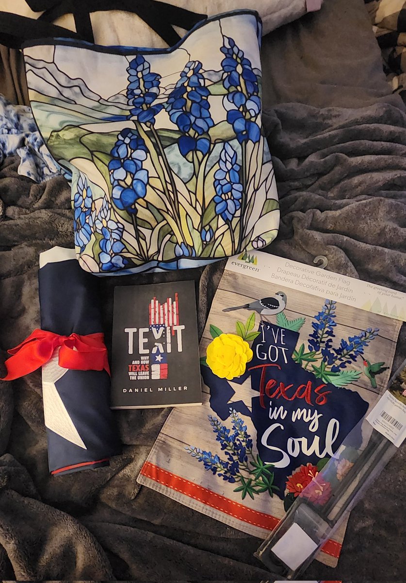 Texas giftbags that I'm putting together for my mom and grandmother for Christmas this year! A 3x5 Texas flag, Texas-themed garden flag & stand, and the Texit book, all in these super pretty Bluebonnet tote bags I found on Amazon!