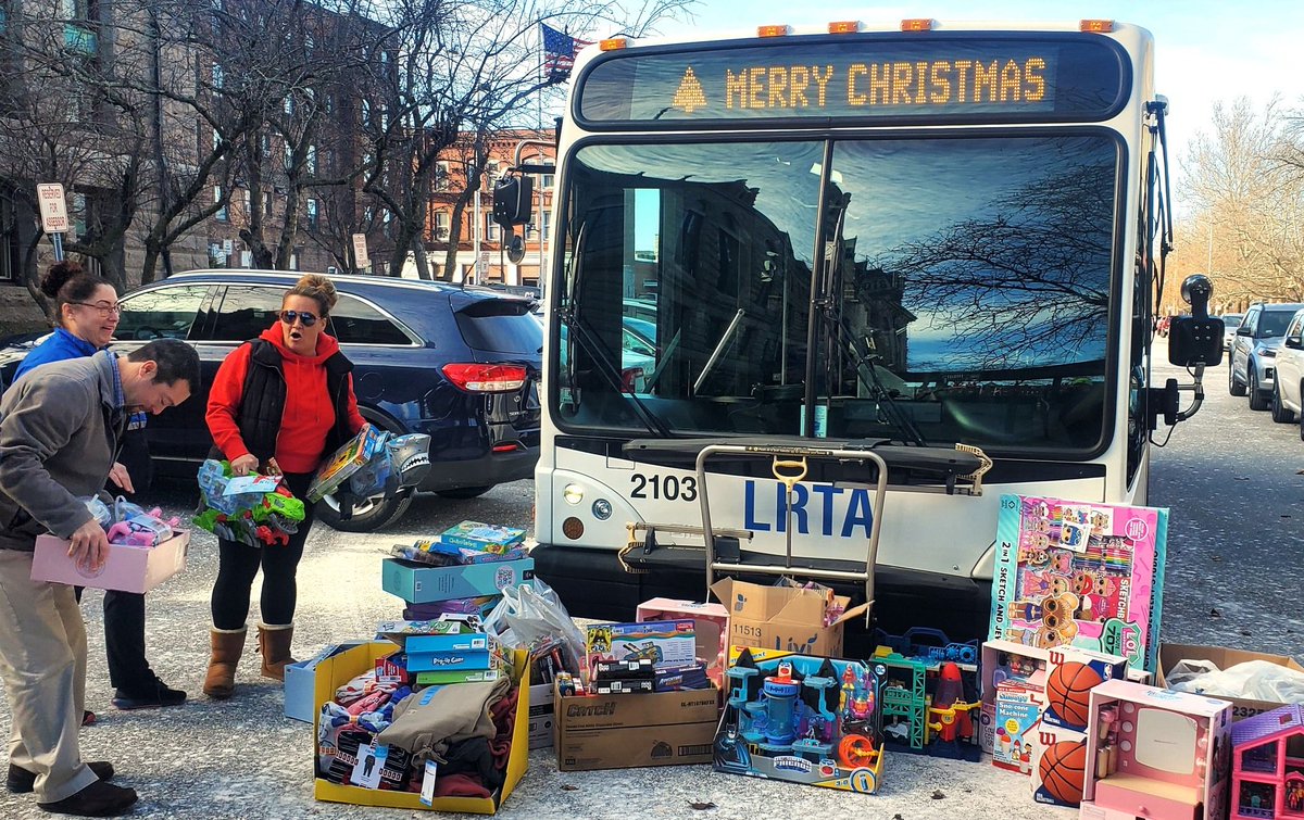 Spreading Holiday Cheer! The LRTA Team, comprising management, union (ATU Local 1578) & LRTA employees, conducted a fund-raising drive to benefit Lowell PD's Annual Christmas Toy program for local kids. The Team transported a bus filled with over $2,000 worth of toys to LPD HQ.
