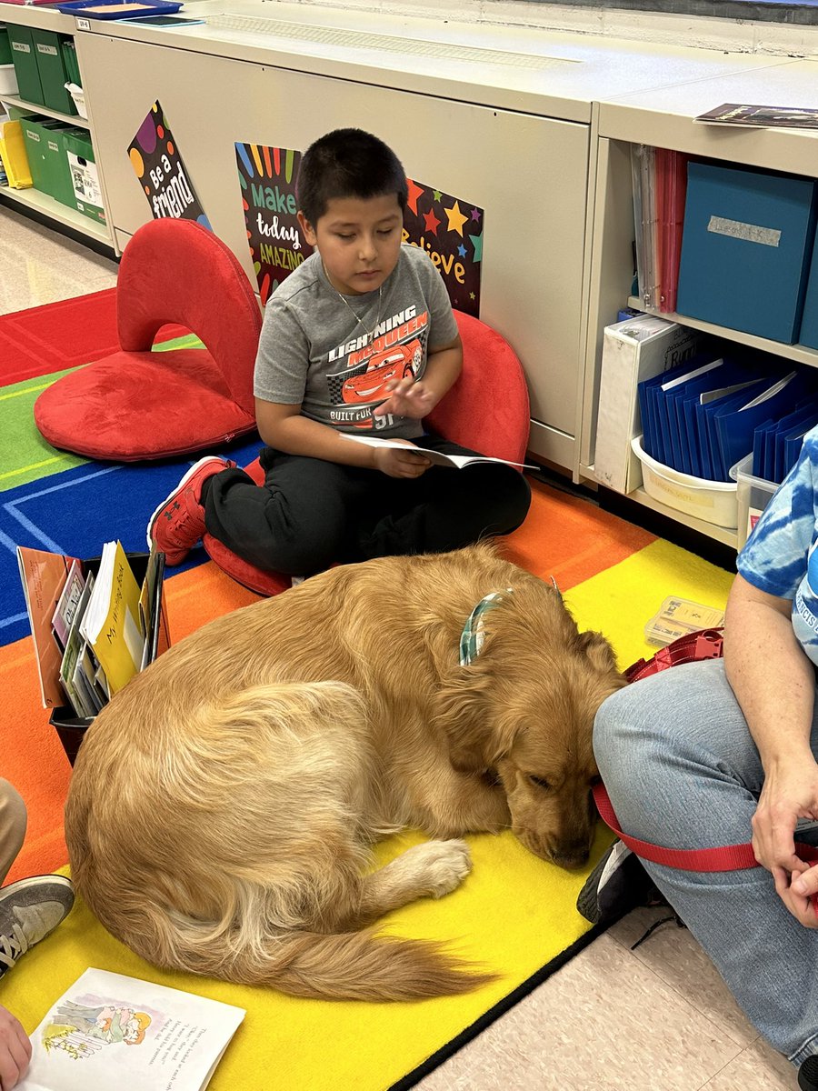 Students enjoyed reading to Alee and Marley today!!!