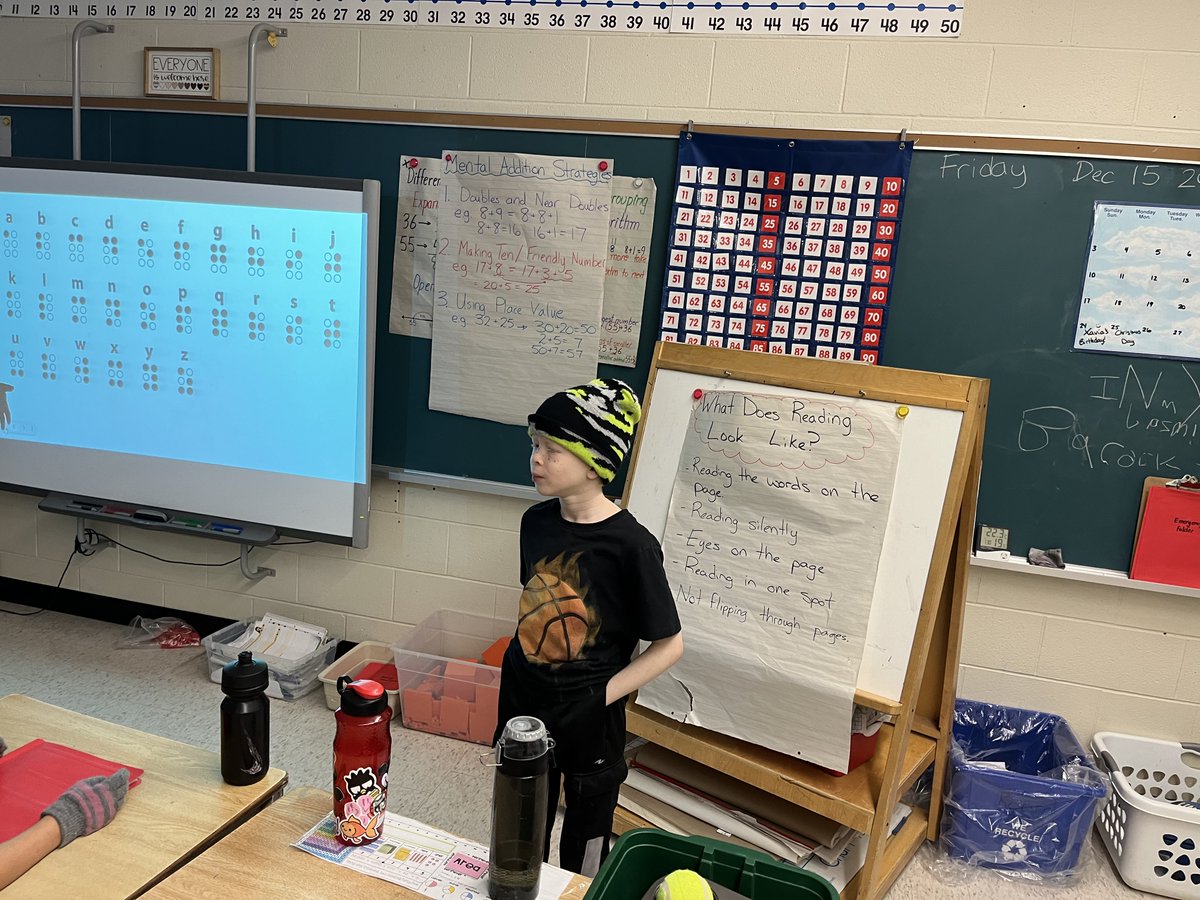 Think of how challenging it might be at 8 yrs old to talk about something only you in the class do... something that sets you apart in your school day... to not just all your peers but a bunch of adults too.

When you know you're really good, you stand like this and own the room.