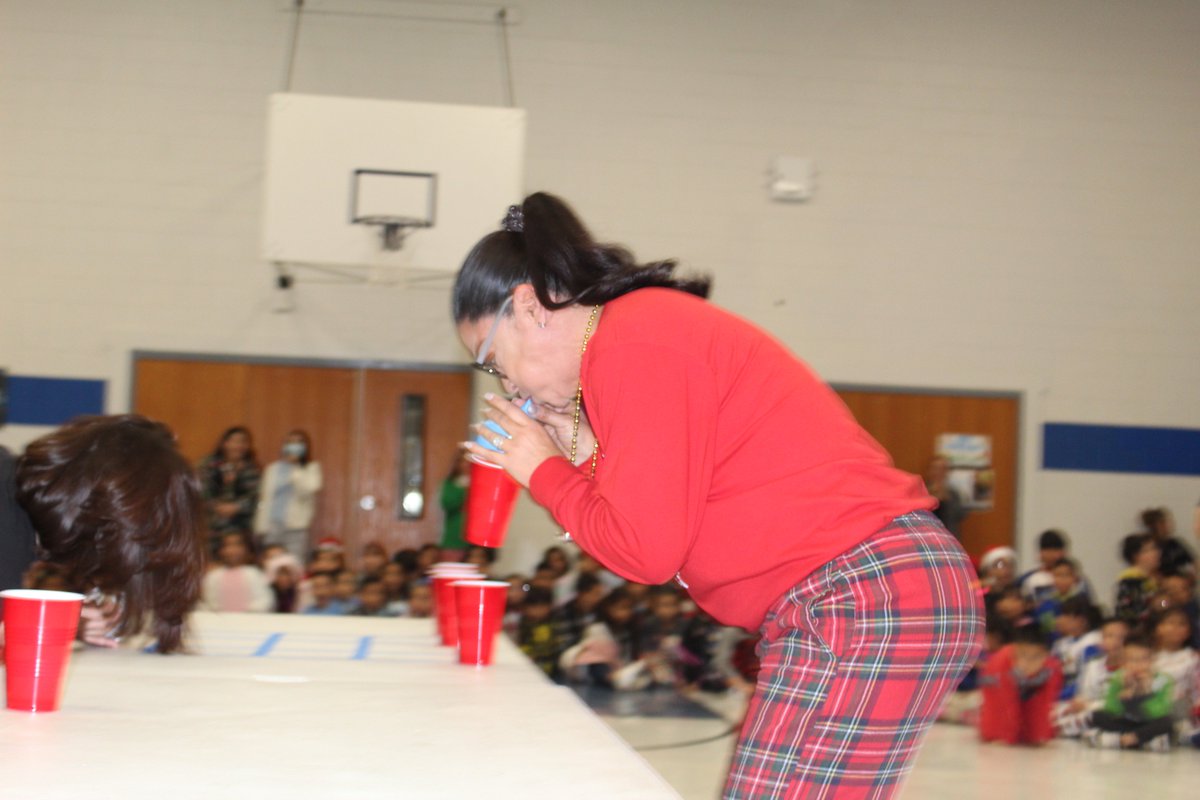 Stacking cups with a balloon and strong lungs.
