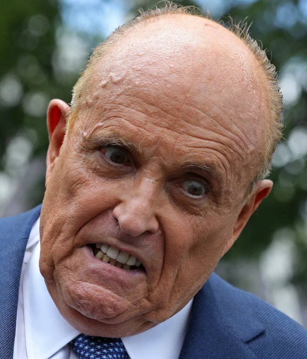 Describe Rudy Giuliani in ONE word.