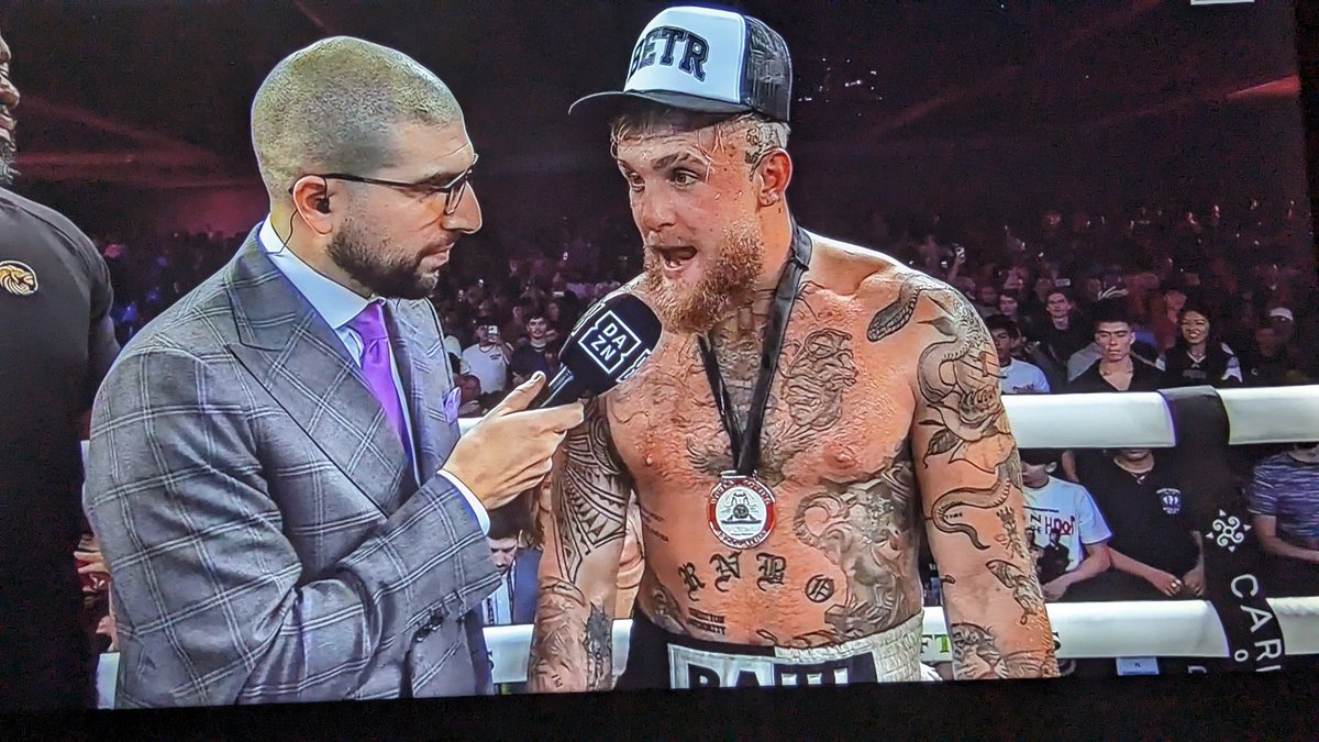 Jake Paul pays some random boxer to take a first round dive then talks smack on the mic with his participation medal. #PaulAugust