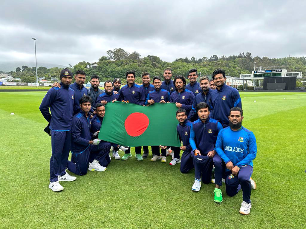 Bangladesh team celebrates Victory Day during their tour in New Zealand, posing proudly with the National Flag.

#BCB | #Cricket | #BANvNZ