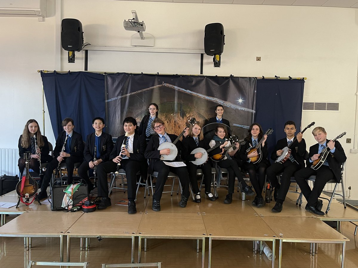 Mr Sullivan and our Traditional Irish musicians getting ready for their first show on the road - debuting at @DunstansPrimary last week with a mixture of Irish, French, Polish and Scottish tunes. @BishopChalloner