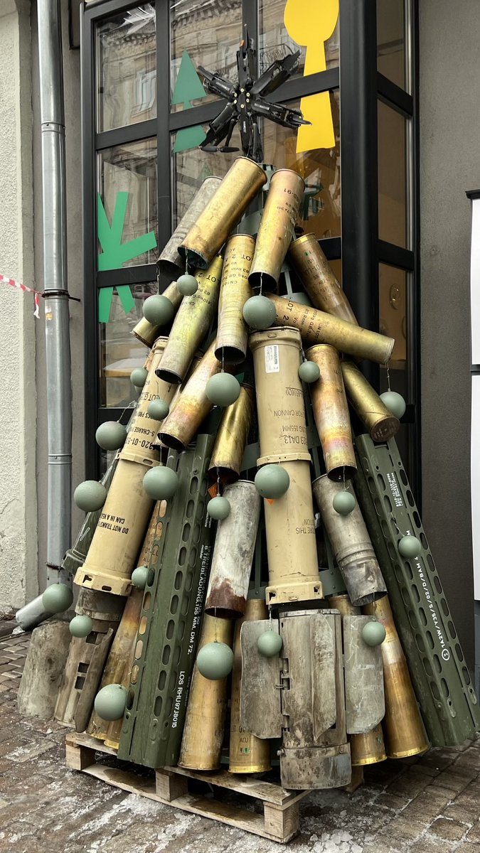 New Year’s tree in Kyiv as the reminder of what the price is paid for these winter holidays spend in the capital of sovereign Ukrainian state but not a russian dominion. The tree is done from artillery artefacts by cafe “Honey”