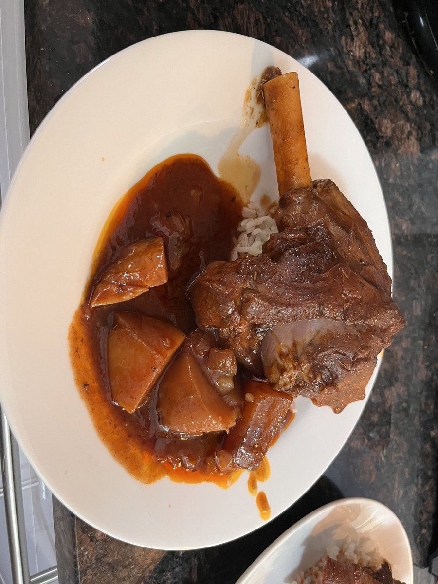 Lamb shank slow cooked.