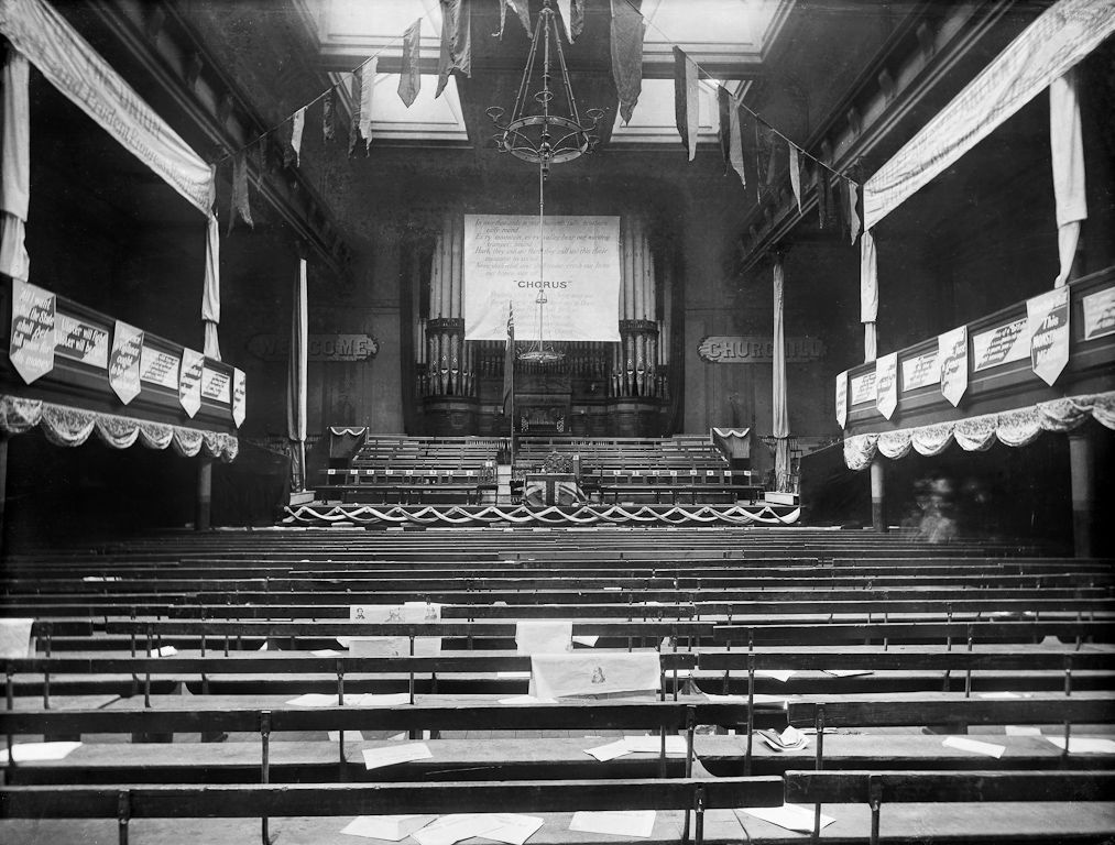 A view of the first City Hall in Perth decorated with banners to welcome Winston Churchill in September 1901, as he delivered a lecture entitled 'The War as I saw it' to a 'large and fashionable audience'.

📸 Burrows Brothers, #PerthArtGallery Ref: MJ1200