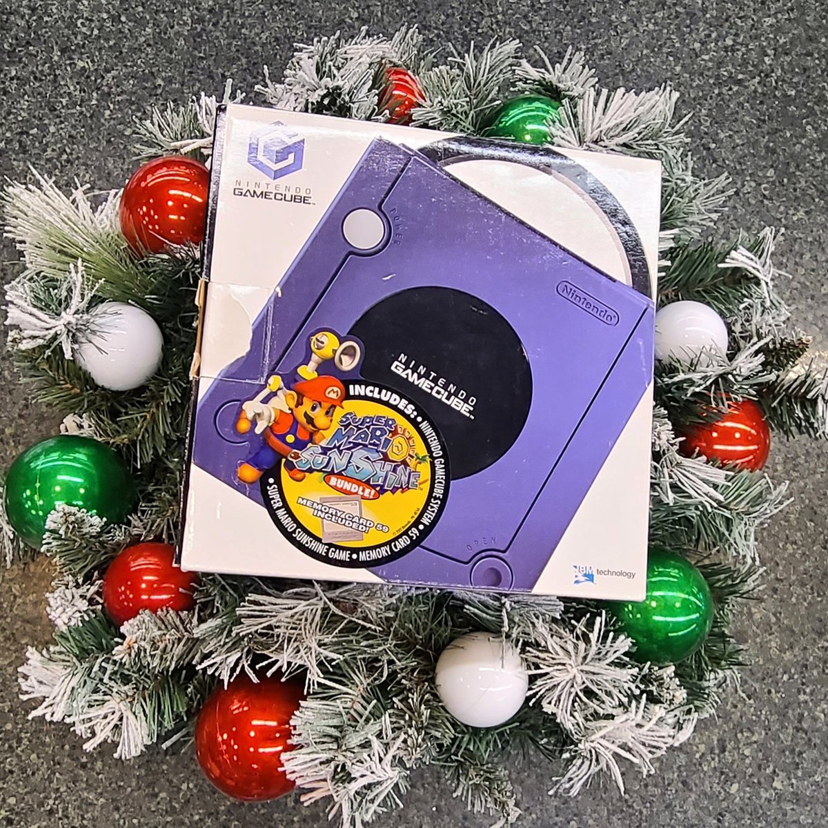 Want to treat your Player Two to something special this year? Power up with this Nintendo GameCube bundled with Mario Sunshine to surprise them underneath the tree! <a href="/bookmansmesa/">Bookmans Mesa</a> Availability is not guaranteed. #nintento #videogames #mariosunshine #gamer #vintageconsole #holiday