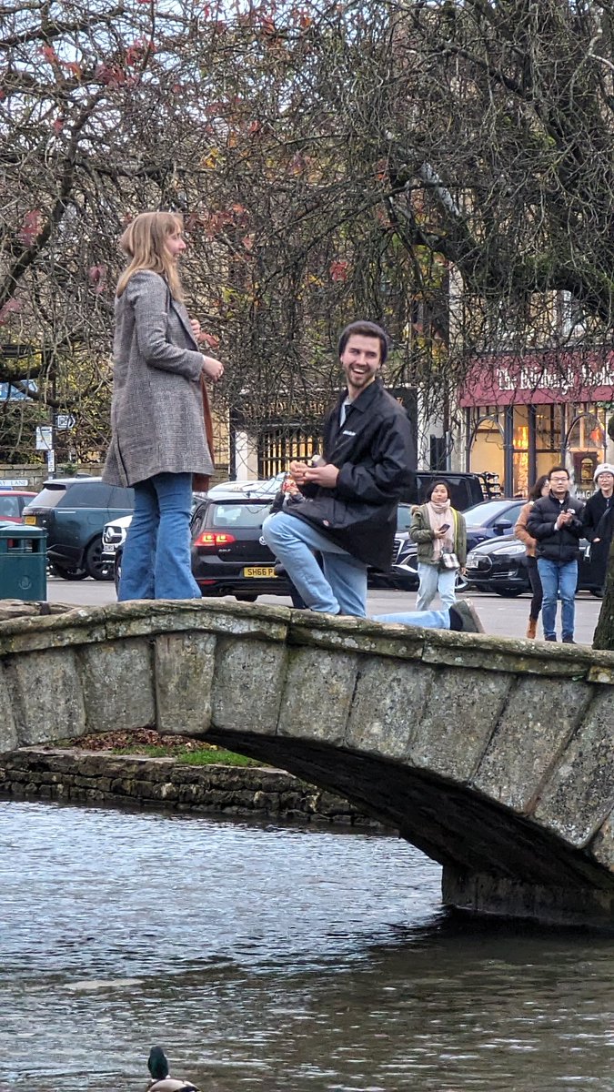 If anyone knows this couple please let them know I have some pictures of the marriage proposal which took place, today around 3pm  in Bourton on the Water. I was too late and lost sight of them before I could reach them.