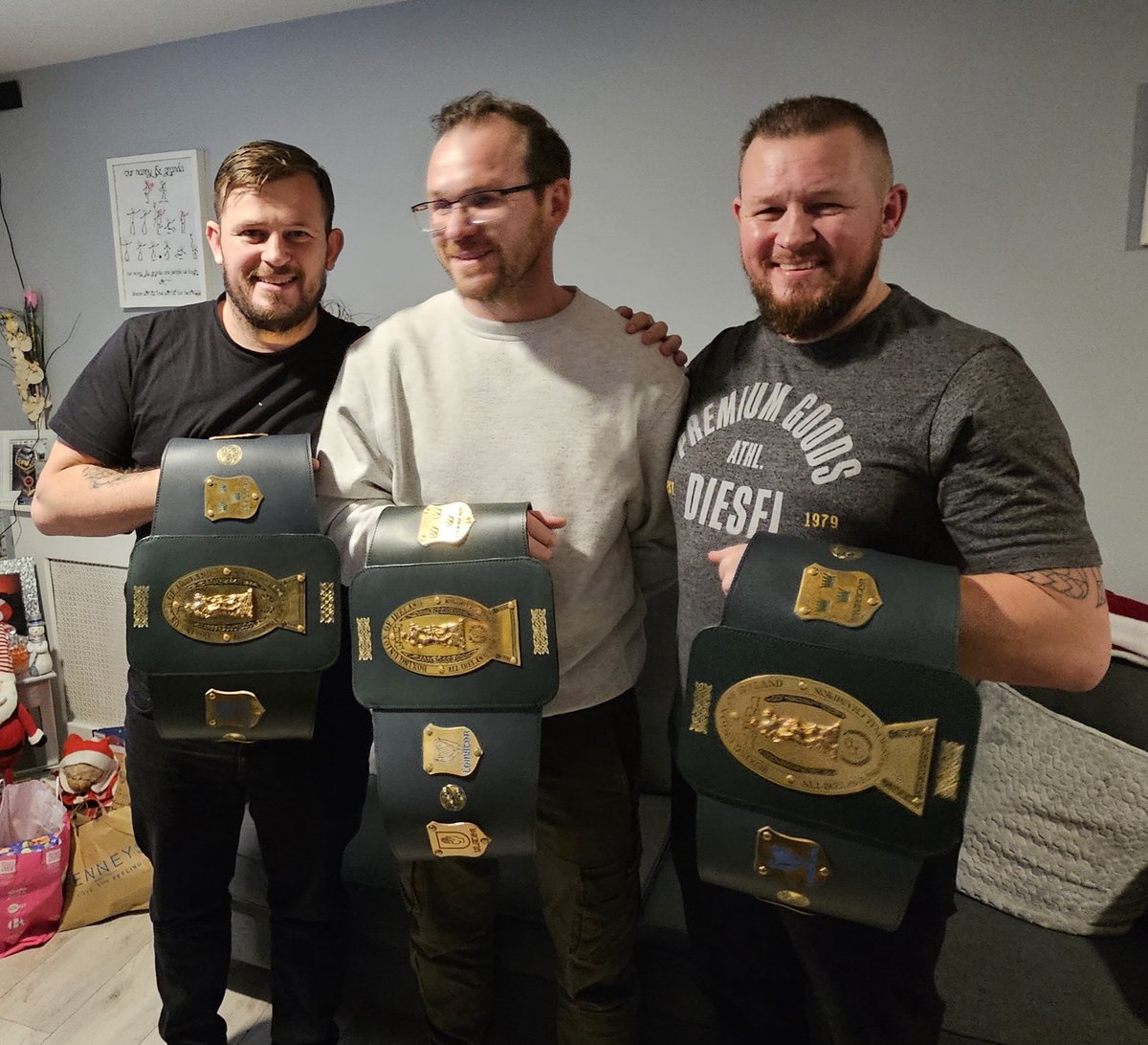 EdwardHyland81's tweet photo. An emotional night for myself &amp; two brothers. The last time we held our Irish titles was 8 years ago. When our dad died we buried them with him because it was the right thing to do. Thanks mam for this lovely present we love you 😘
#BrothersOfDestruction 
#TeamHyland
#GoldenCobra https://t.co/Il4Fb72Kgz