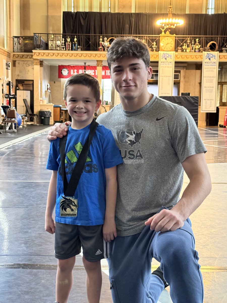 CoreyHaddad's tweet photo. Vince gave Lincoln his Ironman gold medal after their awesome lesson this morning! #TeamGreco @SemWrestling https://t.co/TQXdzvtyfz