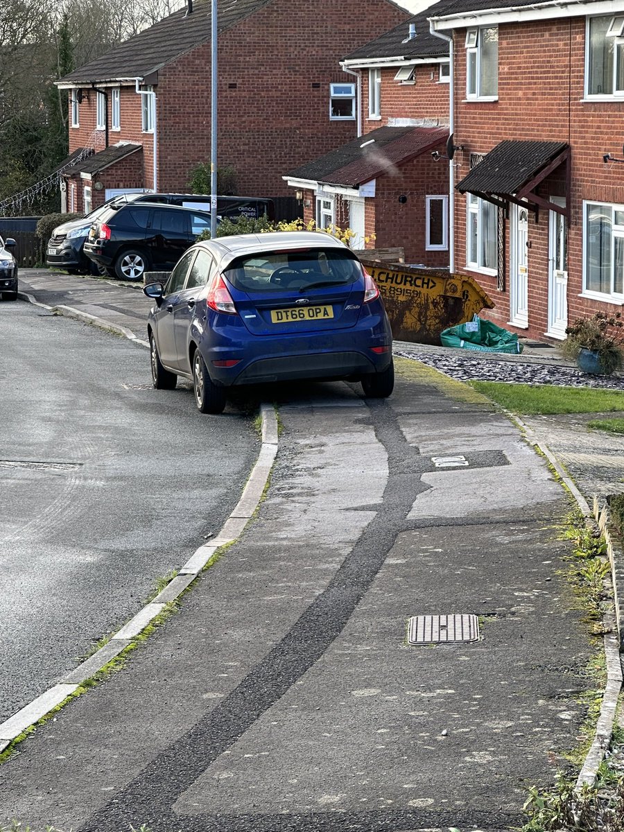 Reg no DT66 OFA parked in Mendip Close Melksham Wiltshire on Monday December 11 2023 at 12.01pm. Parked on the wrong side of the road, and partially on the footpath, obstructing pedestrian access.