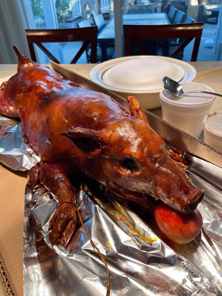 Today is #NationalRoastSucklingPigDay - If you like crackling skin with moist meat, head down to Eva's Lechon in LA's K-Town.  #NationalFoodHoliday