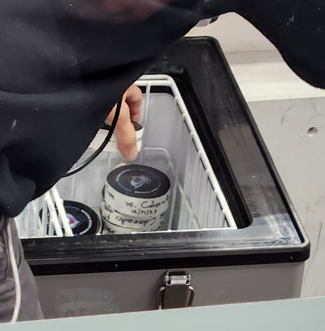 The puck cooler with the pucks that scored.