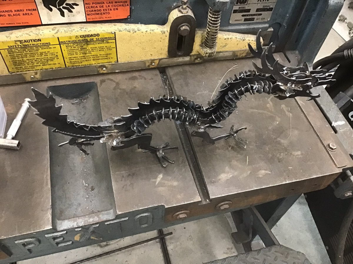 SeilerHenderson's tweet photo. Three roses using Oxy-acetylene torches and Mig welding. Dragon cut from CNC plasma cutter and then Mig Welded. Cube in a cube machined on the HAAS Mini Mill using Fusion 360. Wonderful job by the students. @HWDSB_SHSM @Director_HWDSB @Henderson_HWDSB @adskFusion @SircoMachinery https://t.co/bNpMJHRGRo