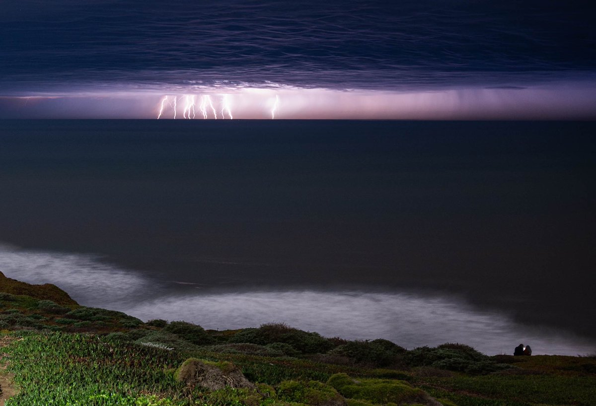 Lightning strikes across the Pacific Ocean as seen from Mussel Rock Park in Pacifica, Calif. in this multiple-exposure image taken just before midnight Sunday, December 17, 2023. The National Weather Service issued a Special Marine Warning for the area. #CAwx