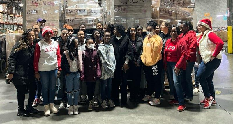 DDPGirls's tweet photo. Books for Africa service project on December 16 - Having youth engage in community service is a win-win opportunity for all. On average, the girls in DDP volunteer over 400 hours each year. https://t.co/SGr2N8Pz7R