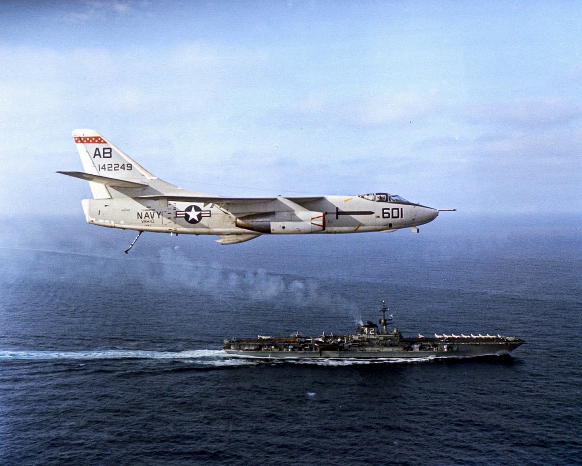 A U.S. Navy Douglas KA-3B Skywarrior from Heavy Attack Squadron 10 (VAH-10) Det.42 the Vikings flies past the aircraft carrier USS Franklin D. Roosevelt. 1966/67 shot (USN NMNA)