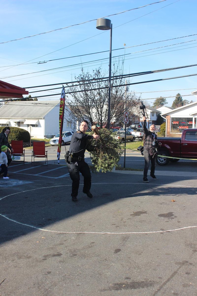This weekend officers from patrol and the support services unit took part in More Miles Automotive' s annual tree toss. This unique and festive event raised almost $2,300, for Turning Point of Lehigh Valley. We can't wait till next year’s event!