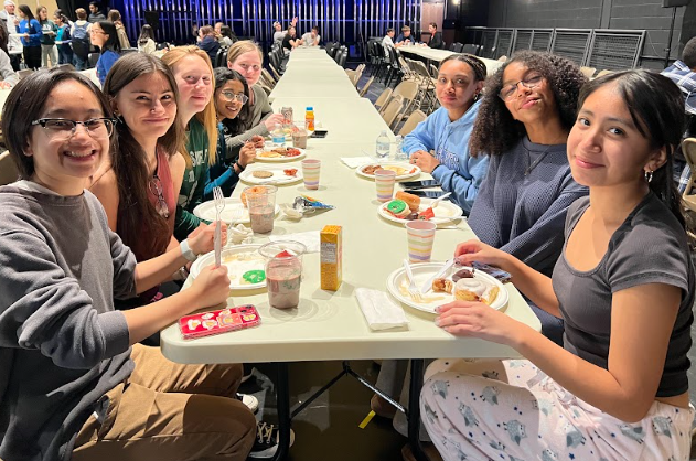 Our HS Music Department gathered Friday morning for their annual pancake breakfast cooked up by three very talented chefs/music teachers!  #umasdistheplacetobe