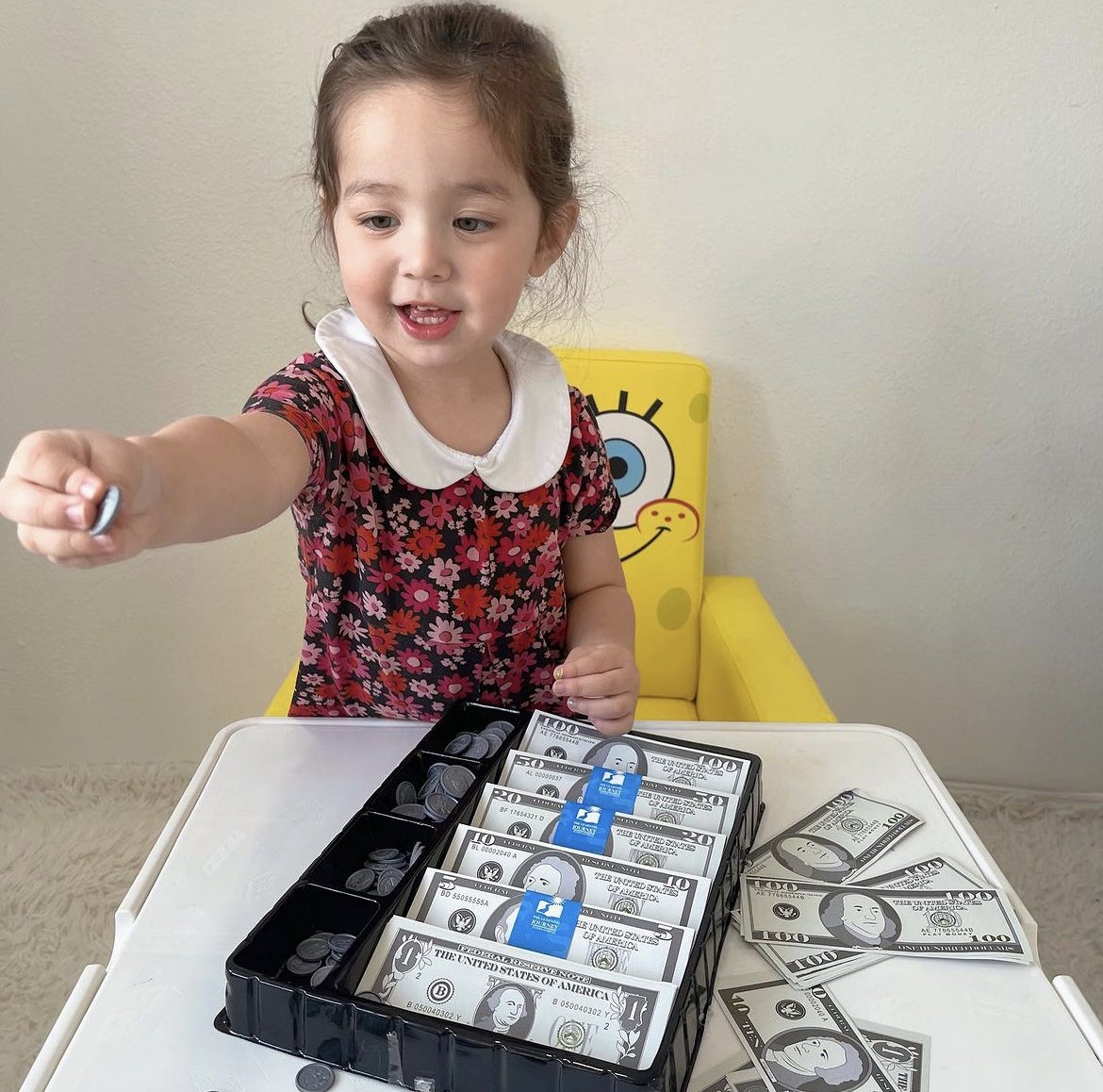 This "stash of cash" contains more than $5,000 in realistic play money! Kids can sharpen their counting and mathematics skills as they play! The money conveniently stores in the reusable plastic storage tray. 🧠