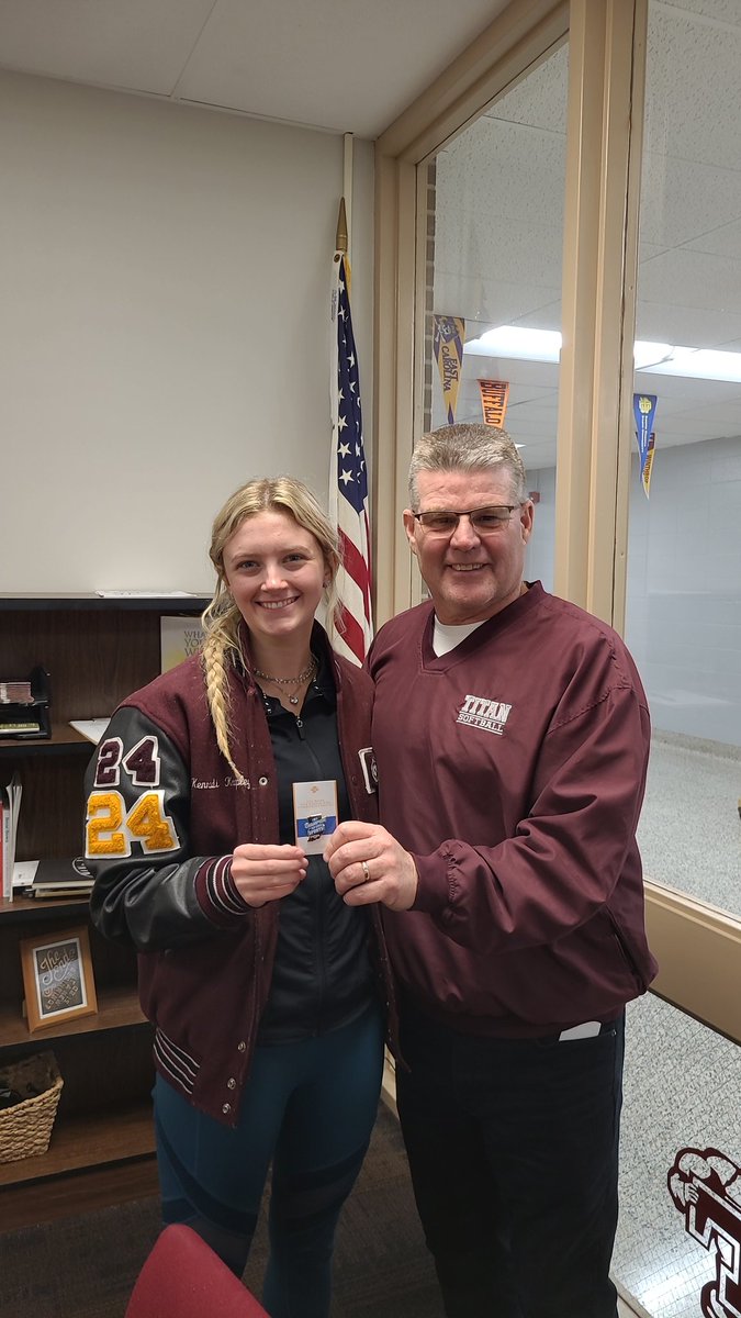 Senior Kennadi Knepley received an exemplary report for good sportsmanship in our game against Union City. She is receiving a sportsmanship pin from Tri AD, Bryan Peggs.