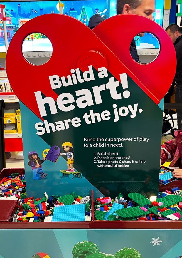 Empower your child to spread joy this season with LEGO's Build to Give! 🌟 Simply build a heart, share it with #BuildToGive, and LEGO will donate a set to a child in need. See how other brands are innovating this season here: buff.ly/47UDcbh