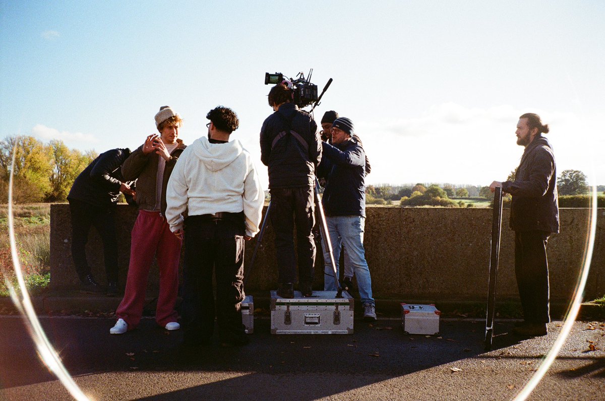 BTS photos from 'stop giving me advice' video shoot. Beautiful times witnessing history. all is yellow.