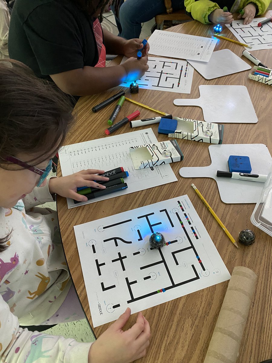 MsGroover2's tweet image. Loving all the CS at @GuilfordEle this month! Kinder made patterns & programmed bluebot to go to the next part, popped into 1st grade where they used the @csforlcps choice boards, 1st also traveled the world with @TerrapinBots, & I saw 2nd using @Ozobot to combine math & phonics