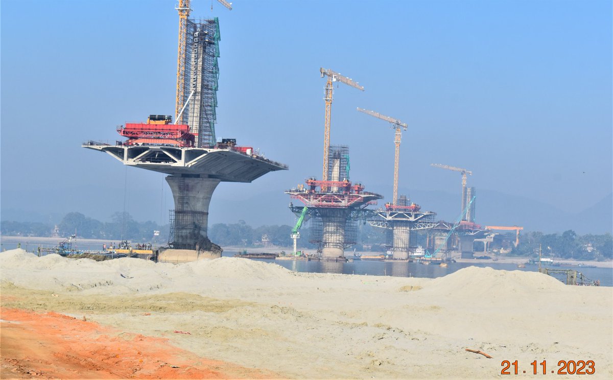 himantabiswa's tweet photo. Bringing both banks closer! 

The Guwahati-North Guwahati bridge over Brahmaputra has achieved nearly 80% progress and will be open to public on time. https://t.co/wiH2IM3laQ
