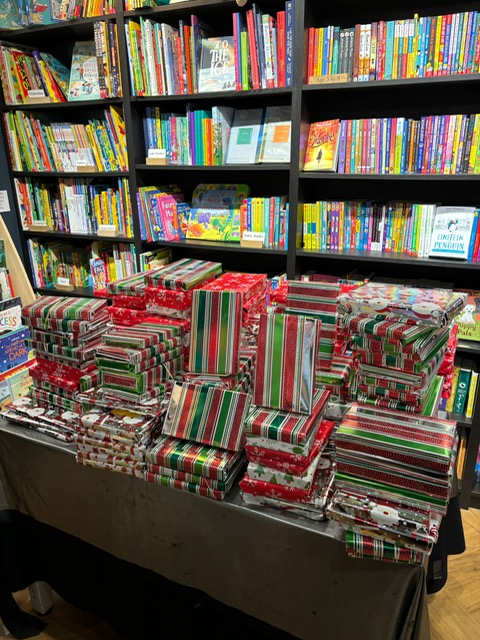 A huge THANK YOU to everyone who contributed to this year's GIFT A BOOK initiative in support of local charities. You've been very generous again this year! We've been busy wrapping all your books, ready for Jane from King's Church, Amersham to make her collection. Take a look!