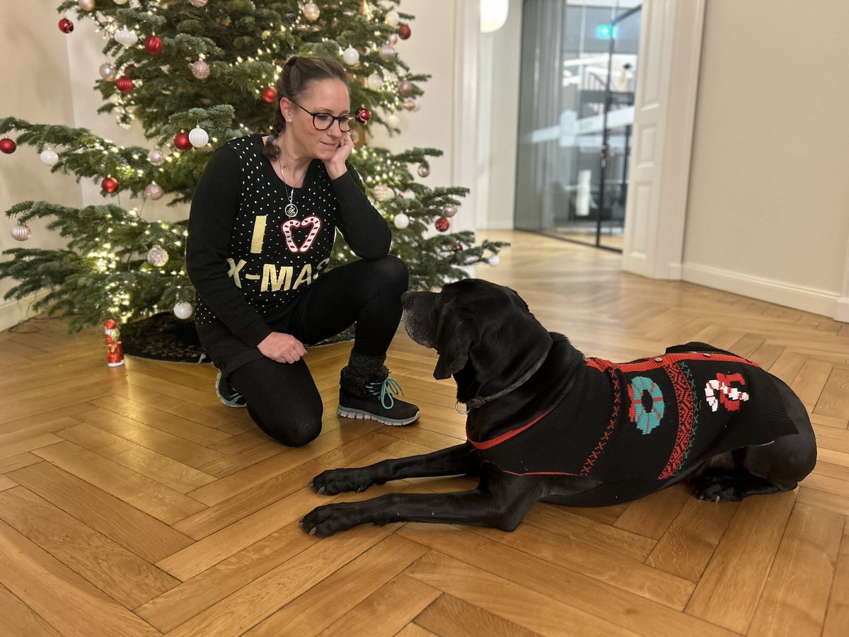 Christmas spirit is in the air in our office. 🎄

Mara from our Finance &amp; Operations team kindly posed for a holiday photo with her four-legged companion, Diesel. 🐶

The entire Scanbot SDK team wishes you a festive season! 👪✨