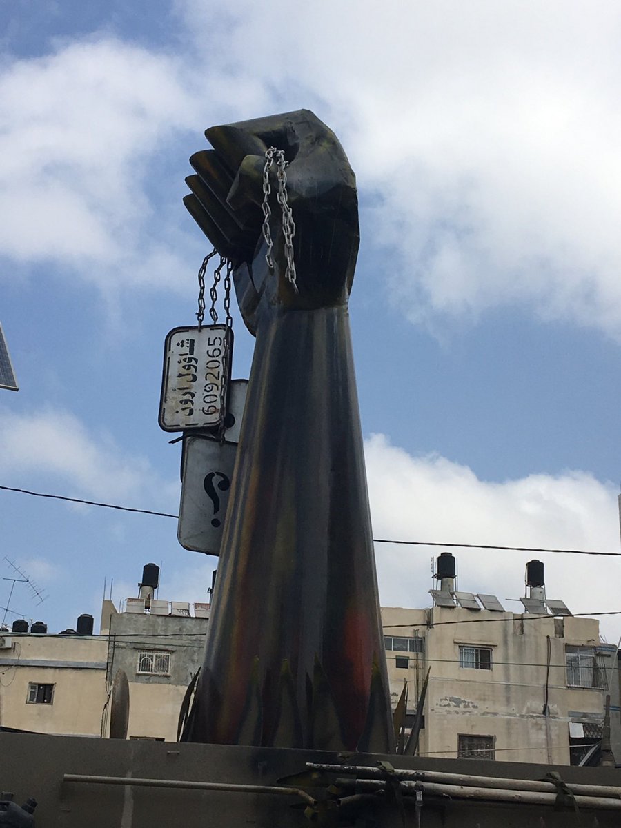 This is a main square in Gaza. In this picture, you can see a fist holding a dog tag, with the name "Oron Shaul" written in Arabic. Who is Oron Shaul you ask?
Oron Shaul was an Israeli soldier, who was brutally abducted and killed by Hamas terrorists during the 2014 Gaza