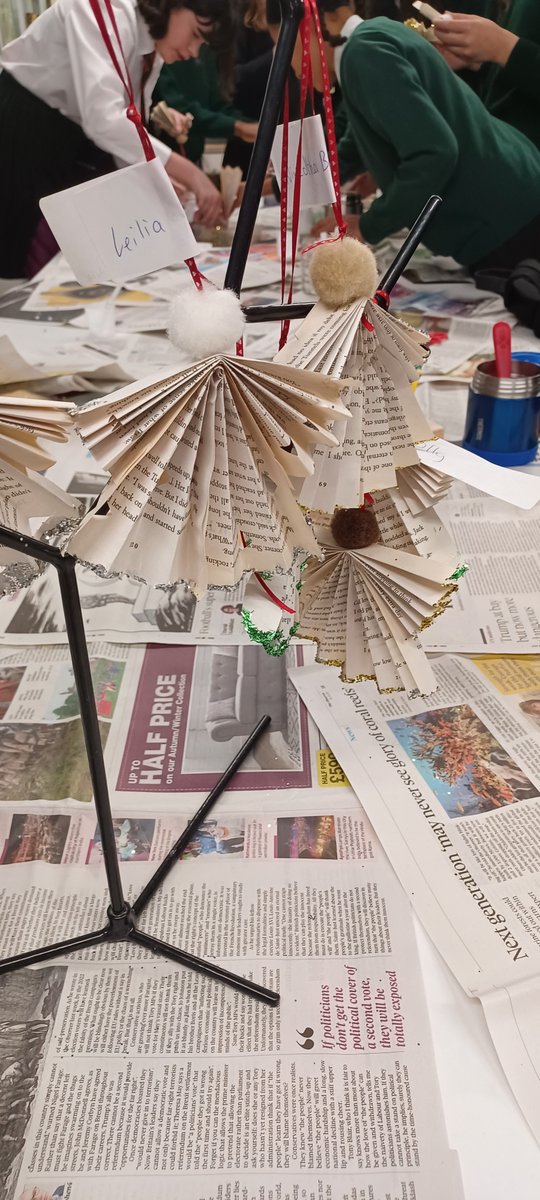 Elmgreenlibrary's tweet photo. Recycled book Angels today in the library @elmgreenschool https://t.co/5ffScRwEsL