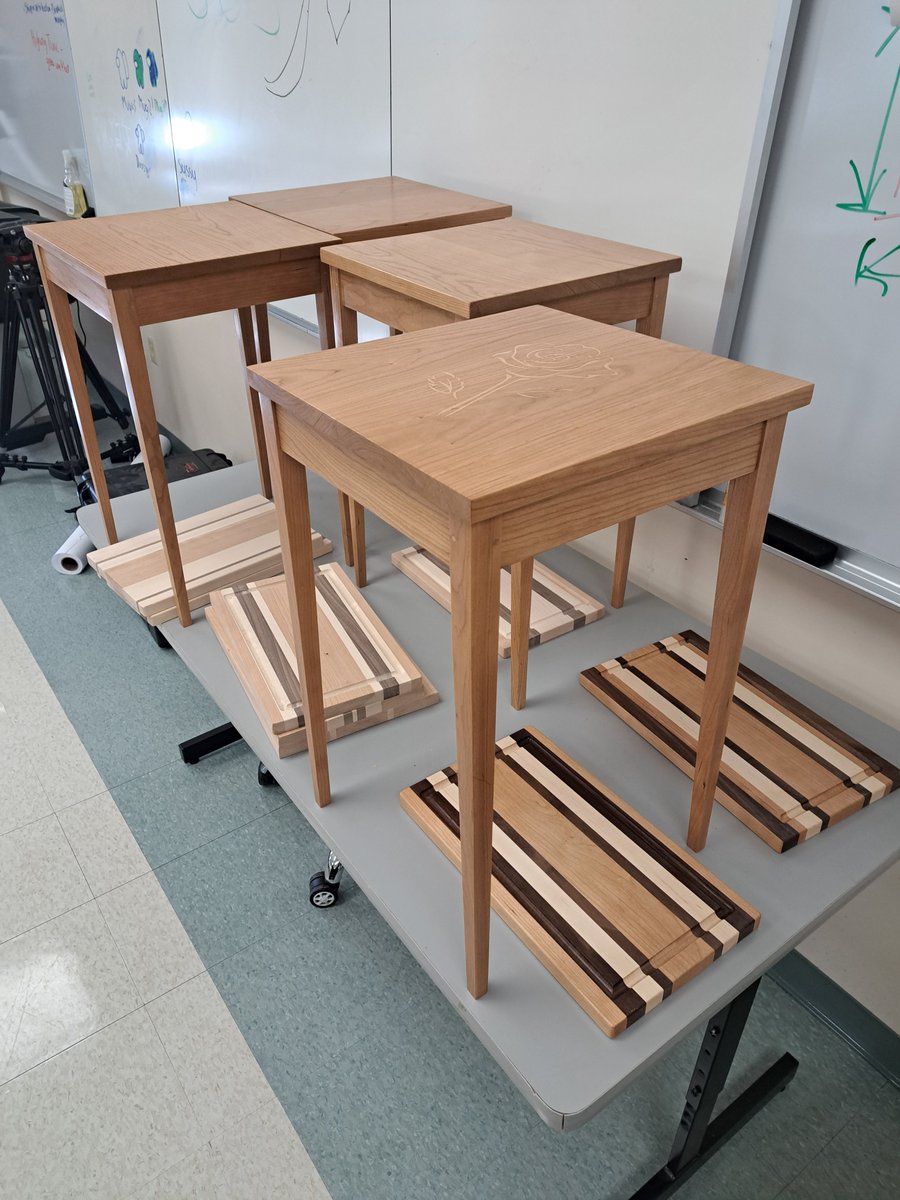 The first year students finished their Shaker style occasional tables this quarter.  Look closely and you will see a maple rose inlay on the cherry top of the table.  #cncwoodworking #woodworking #woodworkingeducation