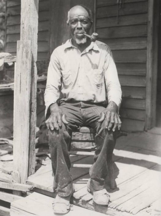 The last American slave ship docked illegally in Mobile, Alabama in 1860, carrying about 160 West African captives. Among them was Cudjo Lewis, who recognized how his birth culture might be erased while toiling in this new land.

So when he was freed, he purchased two acres and…