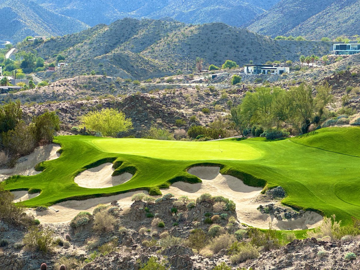 Top100Rick's tweet photo. Stone Eagle Golf Club - 2005 
Tom Doak

What happens when you give Tom Doak a mountainous desert landscape, piles of dynamite, and $75 million dollars?  

Stone Eagle. One of the most remarkable golf courses you will ever play. 

Built into a barren desert hillside, only the bold and/or crazy would consider building a golf course here.  Luckily the world is filled with crazy people. 

The fairways are extremely wide. However, that doesn’t mean drives don’t have meaning. There are huge swales and bumps that can add 20 yards to your drive or send you down to a blind, uphill approach. 

The greens are straight from Mars. They are giant and have huge undulations and slopes. 3 putts are common and chipping from out of position is impossible. The bunkers are deep and punishing. 

The conditions are immaculate. With very low play, it’s rarely a busy place outside of the very peak season. The views of the valley are incredible, one of the best places in town to see the city. 

This was our second visit and it was even better than the first. Our caddie was great, the service was great, and our host was an awesome dude. Truly one of the most unique courses on earth.