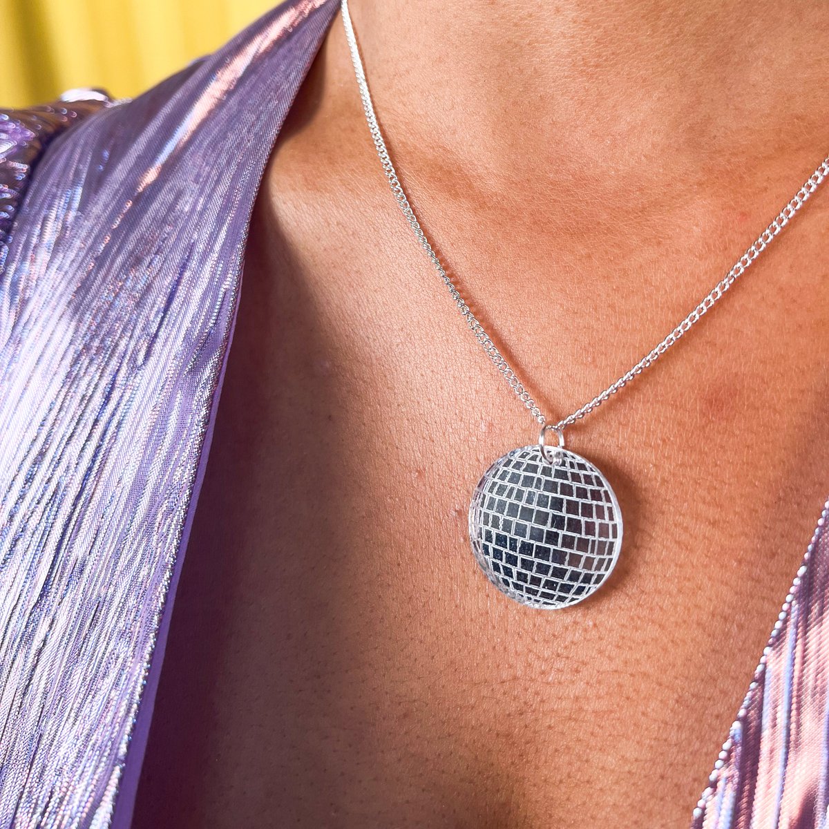 Every party look needs a disco ball! Shop our bestselling Disco Ball Pendant, online and in our Neal Street store: bit.ly/43l4C8y 🪩 ✨