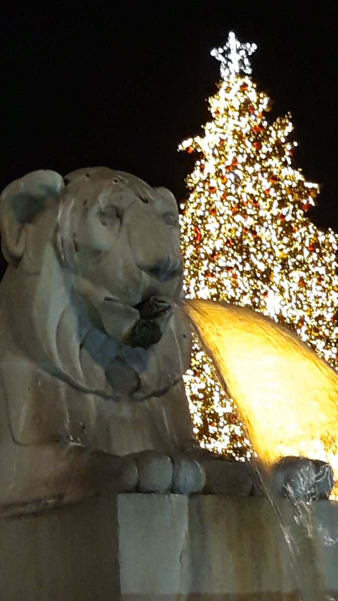 Lion, fire fountain, and tree #Rome