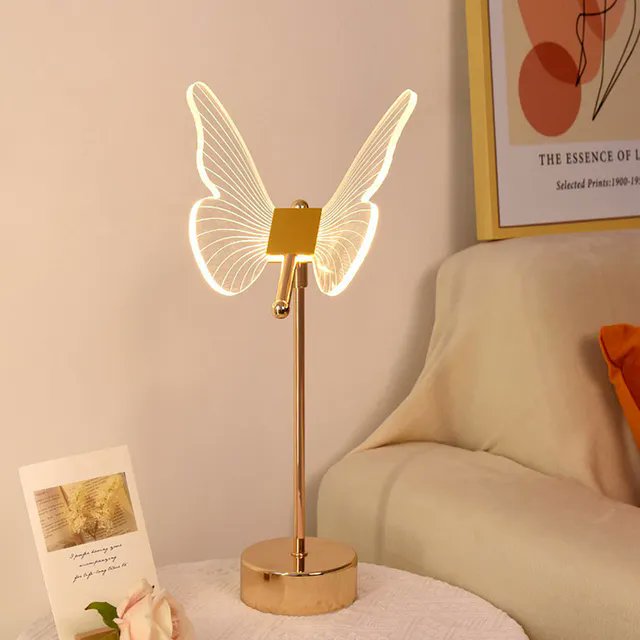 Illuminate your space with the enchanting glow of our Acrylic Butterfly LED Desk Lamp! 🦋✨ Elevate your ambiance and check out our website to get yours delivered directly to you! littlehappyhome.com/product/acryli… #ButterflyLamp #LEDLighting #ArtisticAmbiance #HomeDecor #BedsideBeauty