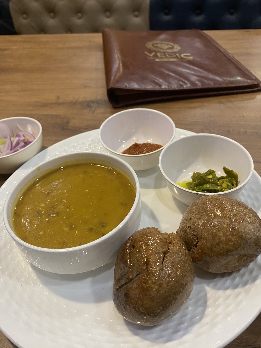 Vedic_restro's tweet photo. Delight in the gastronomic opulence of Dal Bati, a culinary ode where lentil delicacy harmonizes with baked wheat spheres. Each bite, a palatial journey, unfolding the richness of flavors. A rendezvous of tradition and taste, elevating your dining realm. 🌶️🍛 #dalbati https://t.co/a7oShDOfPJ