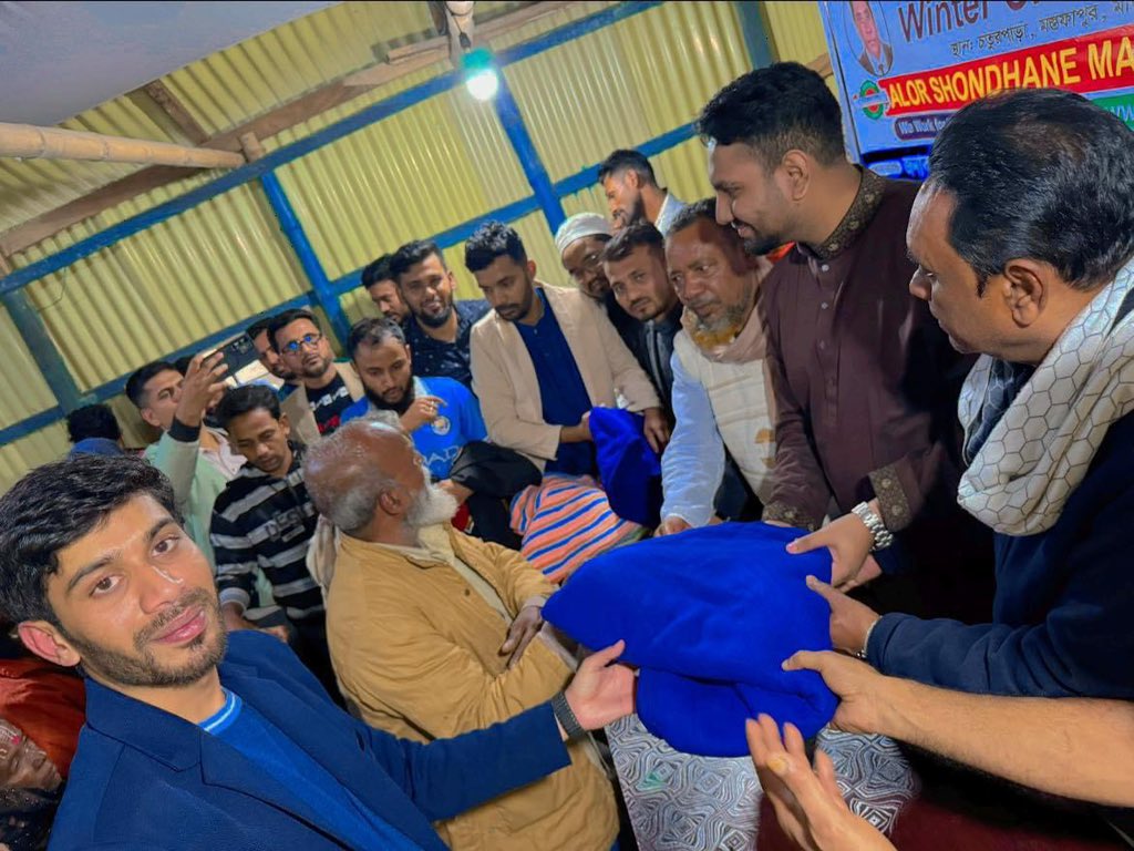 ASMS_2021's tweet photo. Under the initiative of Chaturpara Spotting Club and @ASMS_2021 Alor Shondhane Manobota Shongostha (ASMS) - Winter Clothing Distribution Event at Mostofapur, Sadar Madaripur, Dhaka, Bangladesh. https://t.co/MTV451p1KA