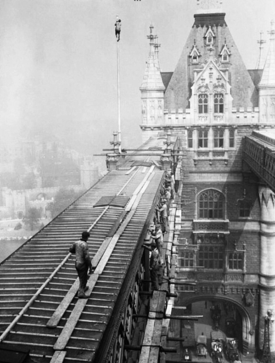 The_East_End's tweet photo. I am aware many of you may already have seen it, but particularly for those new followers - here is one of my personal favourite shots of Tower Bridge (and yes - that IS a lunatic up the central flagpole…) #eastend #History #towerbridge https://t.co/Vrf2ImeEsL